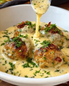 Artichoke and Sun-Dried Tomato Meatballs in Creamy Garlic Sauce | CookWithFeast photo 1