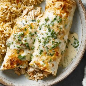 Baked Chicken Burritos with Creamy Green Chile Sauce | CookWithFeast photo 1