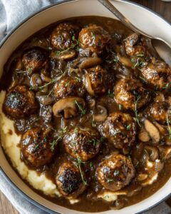 Beef Meatballs with Onion Mushroom Gravy and Mashed Potatoes photo 1