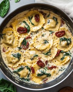 Creamy Spinach and Sun-Dried Tomato Ravioli Recipe | Cook with Feast 1