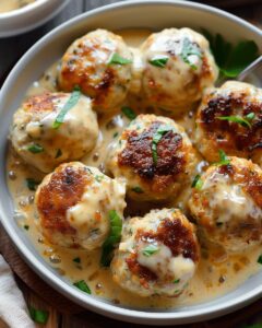 Gourmet Chicken Meatballs in a Creamy Parmesan Sauce: A Comfort Meal Elevated 1